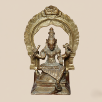 Bronze 9 Inch Sitting Varagi Amman with Thiruvatchi